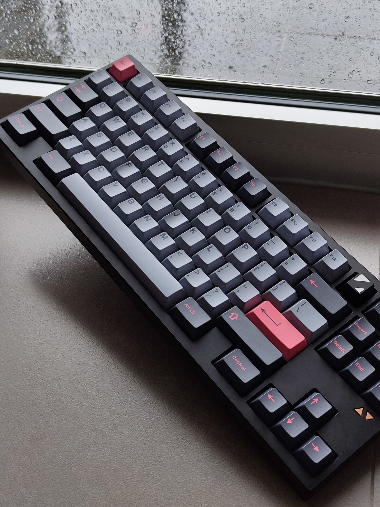 Black keyboard with pink accents
