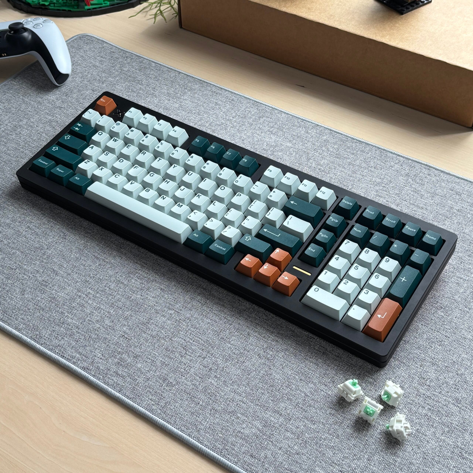 Black, green and brown full-size custom keyboard