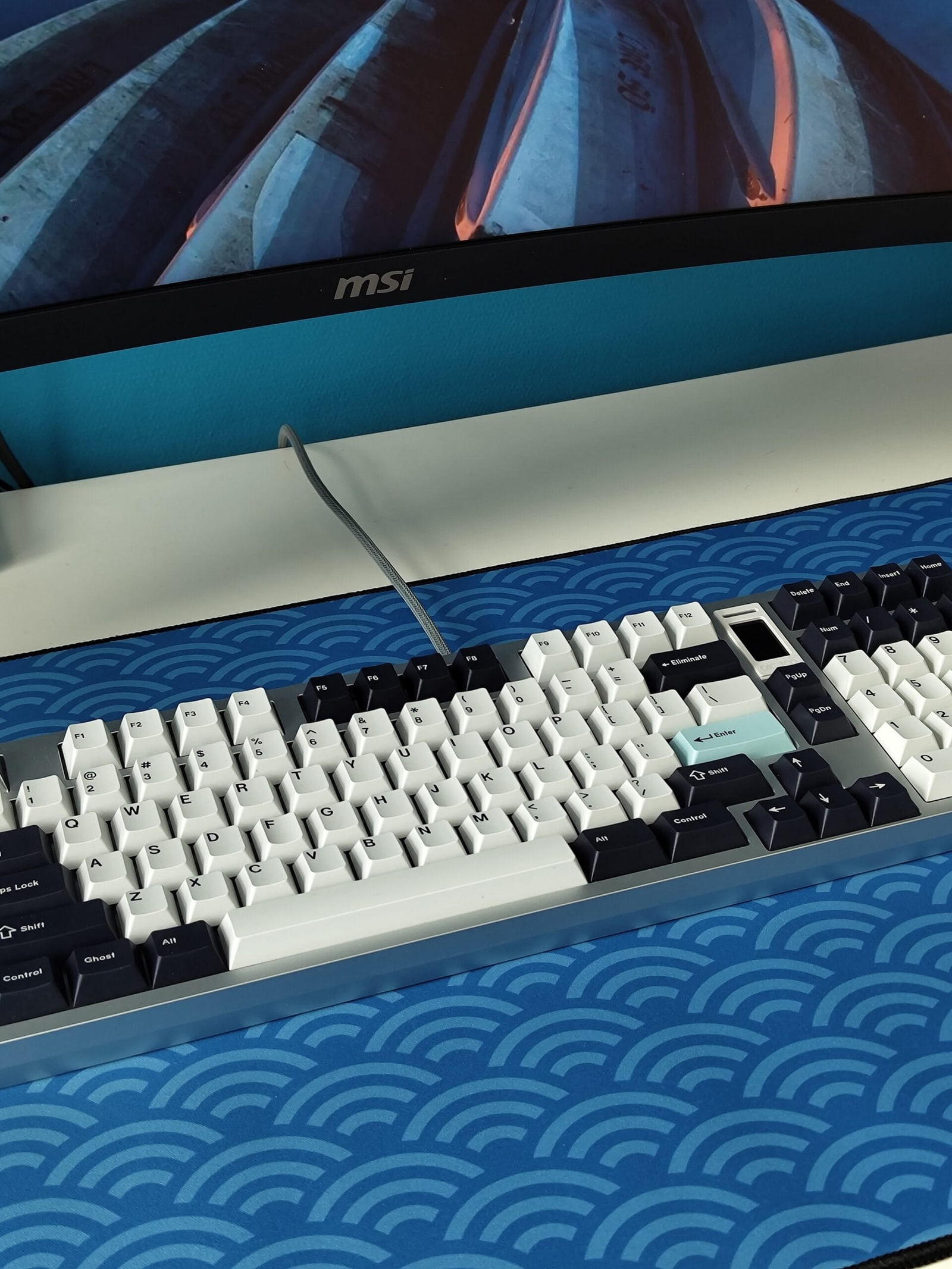 Custom coiled cable matching a corporate keyboard build